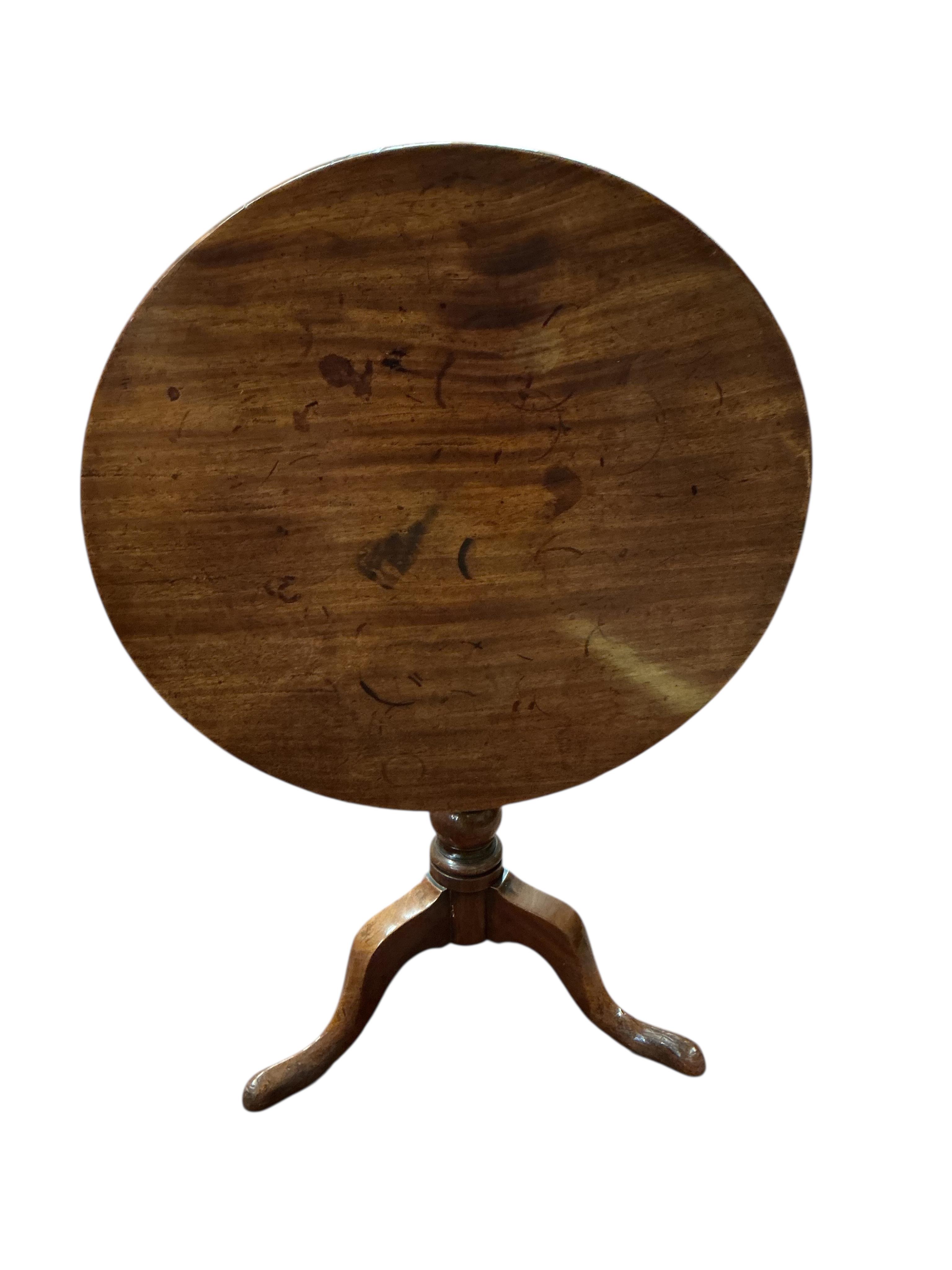 A Victorian mahogany circular tilt top tripod tea table, diameter 76cm, height 73cm